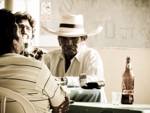 Old Peruvian man in a bar